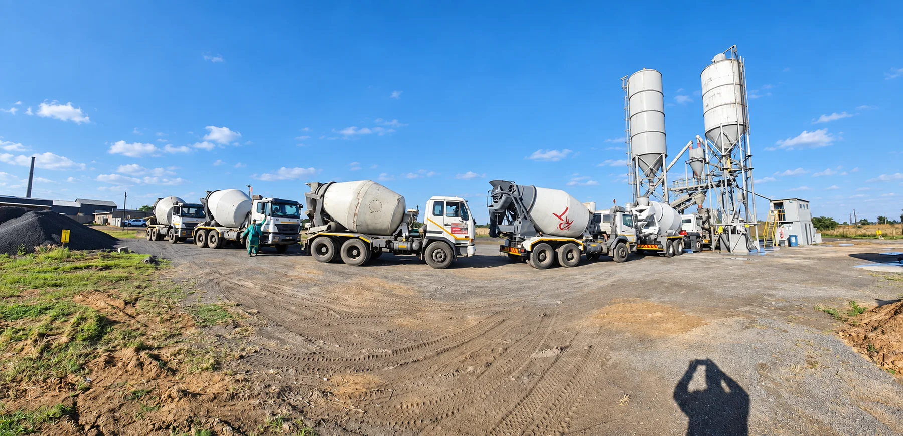 Rock-Tuff ready-mix fleet lined up at the plant