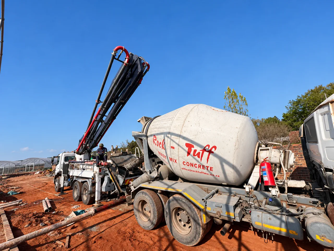 Rock-Tuff mixer truck and pump equipment during concrete placement